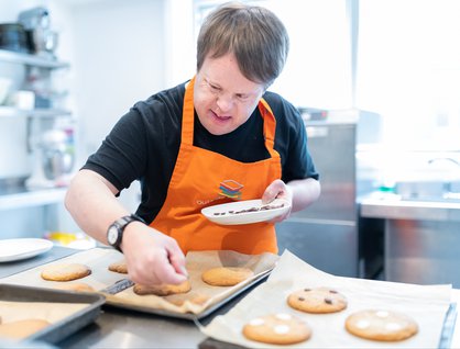Trainee working at Outside the box, a cafe served by individuals with learning disabilities