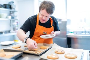 Trainee working at Outside the box, a cafe served by individuals with learning disabilities