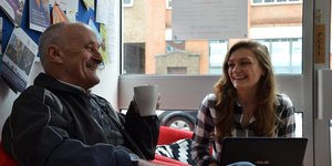 man and women laughing