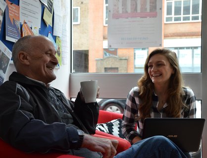man and women laughing
