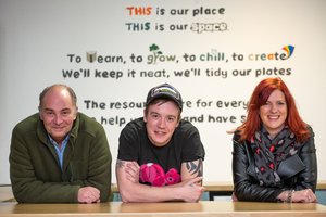 A benefactor of The Young Person's Homelessness Prevention programme with senior staff from the team