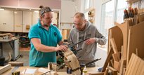 Two men woodworking