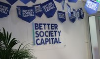 Better Society Capital logo on wall and blue bunting