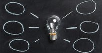 Lightbulb on a chalkboard