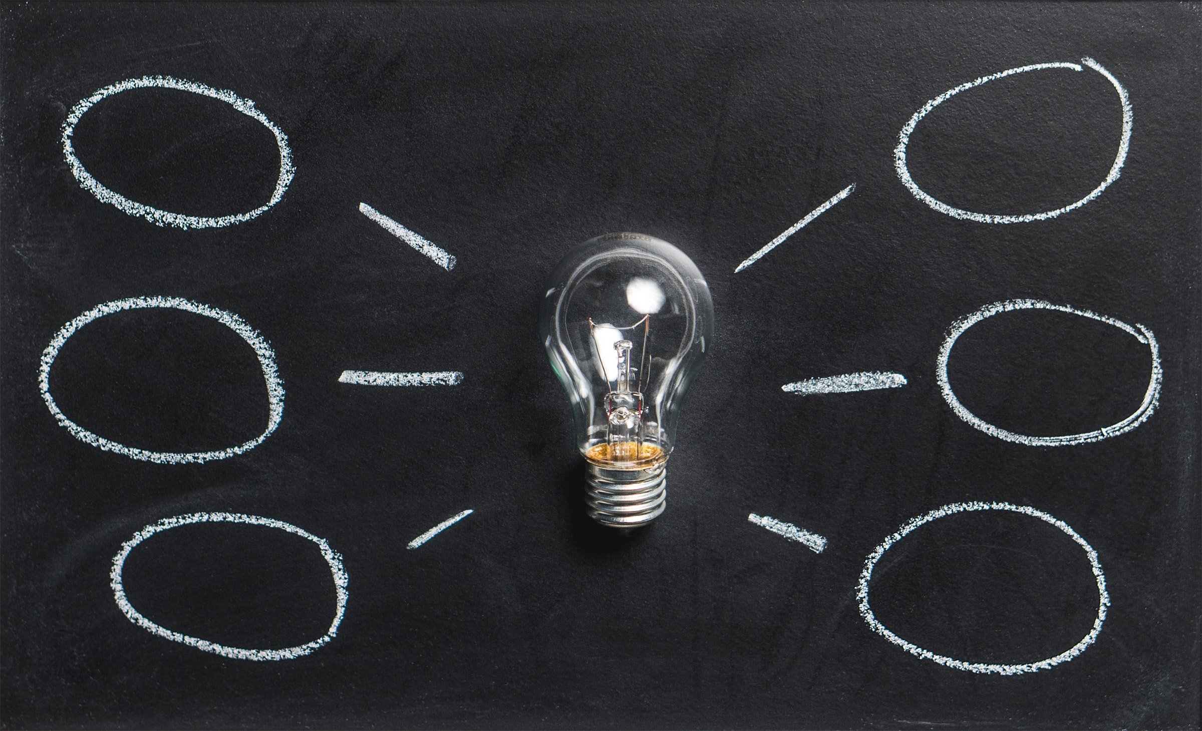 Lightbulb on a chalkboard