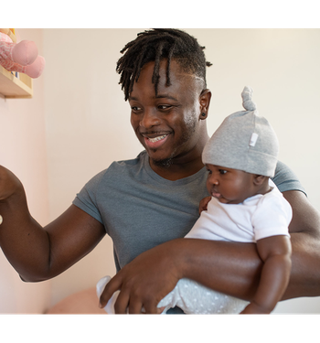 Man holding a baby