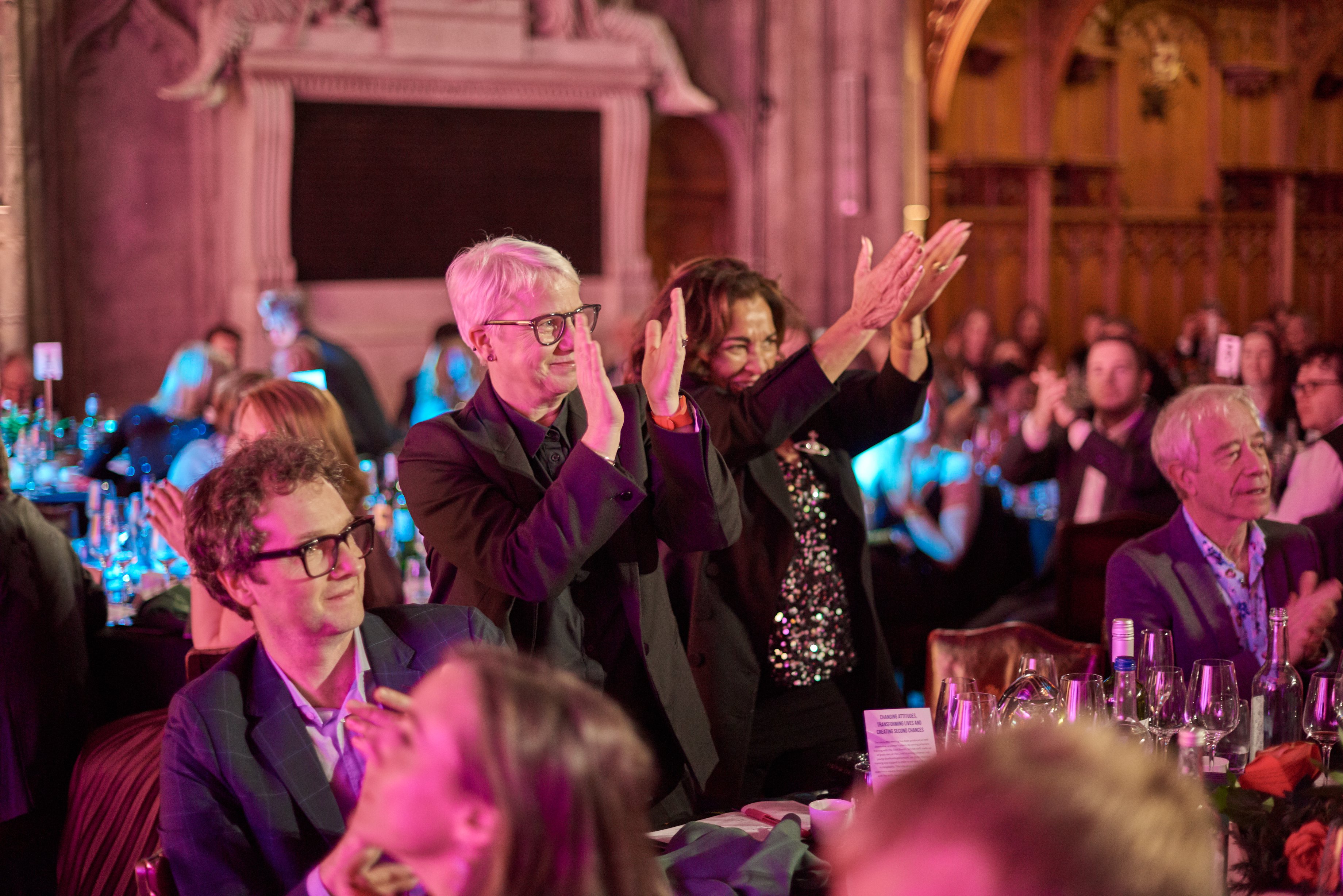 People celebrating at an award ceremony