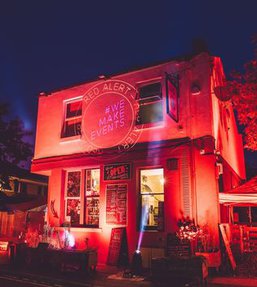 Outside of a pub with lights