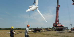 Two men on a windfarm construction site