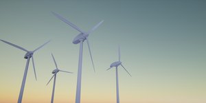 Four wind turbines taken from ground level