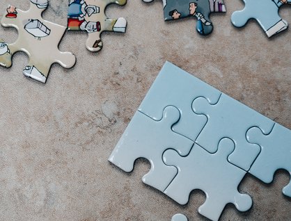 Pieces of a jigsaw, both separate and connected